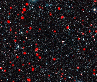 Un cmulo de galaxias lejano con formacin estelar en Fornax. ESO