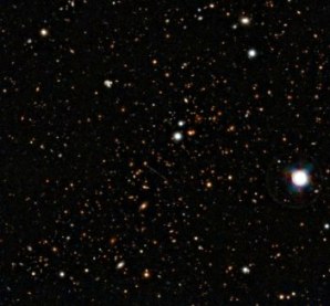 El lejano cmulo de galaxias El Gordo, en visible e infrarrojo. VLT/Spitzer/NASA