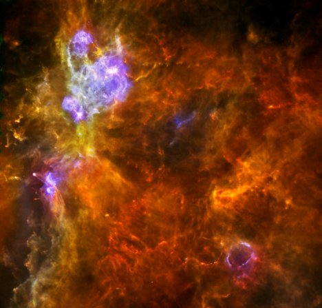 Imagen de infrarrojo en colores asignados de la nube molecular W3. Crédito: ESA/Herschel.