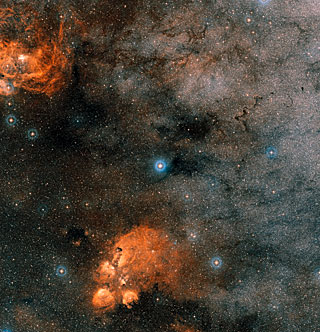 El planeta HD95086 b aparece abajo y a la izquierda de su estrella, fuera del círculo azul. (Haga click en la imagen para agrandar). Crédito: ESO/VLT/NACO.
