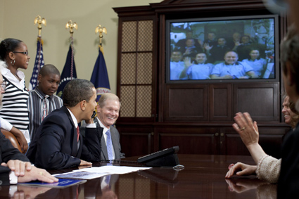 U.S. President Barack Obama speaks to shuttle and station crew members