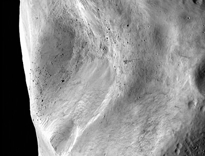 Ilustración de la sonda Dawn de la NASA, frente a Vesta y Ceres.