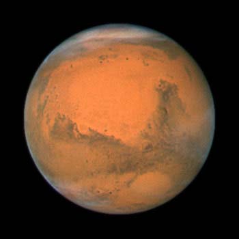 Imagen de Marte tomada por el Telescopio Espacial Hubble de la NASA/ESA. Haga click en la imagen para agrandar. Regalo del InstituCrédito: NASA, ESA, STScI/AURA.